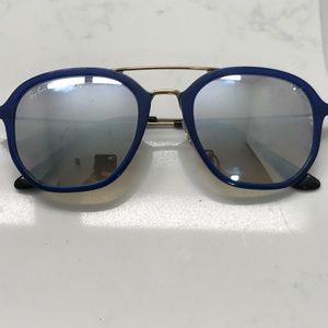 Mirrored Ray Bans with blue frame